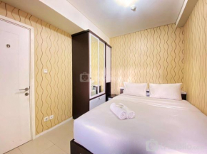 Cozy Living 1BR Apartment at Parahyangan Residence By Travelio
